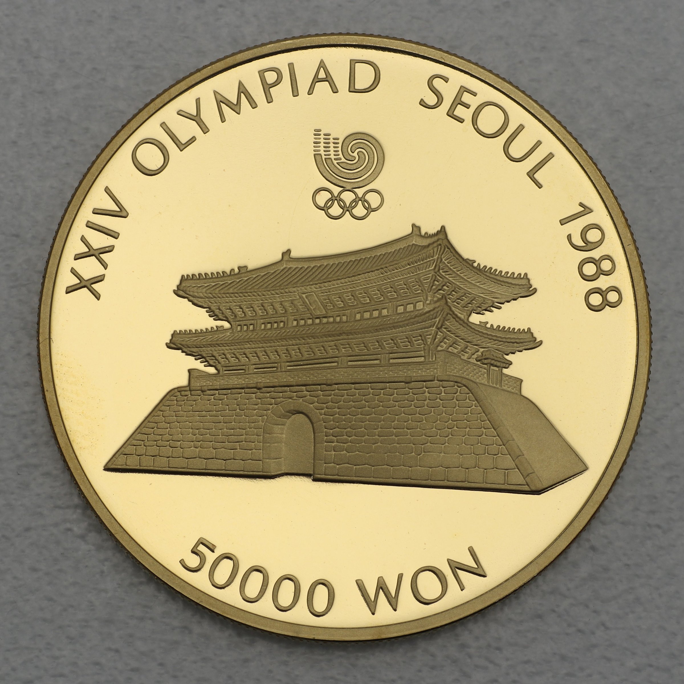 Goldmünze 50000 Won "South Gate" 1987 24. Olympiade in Seoul 1988 (Südkorea) - Hauptansicht