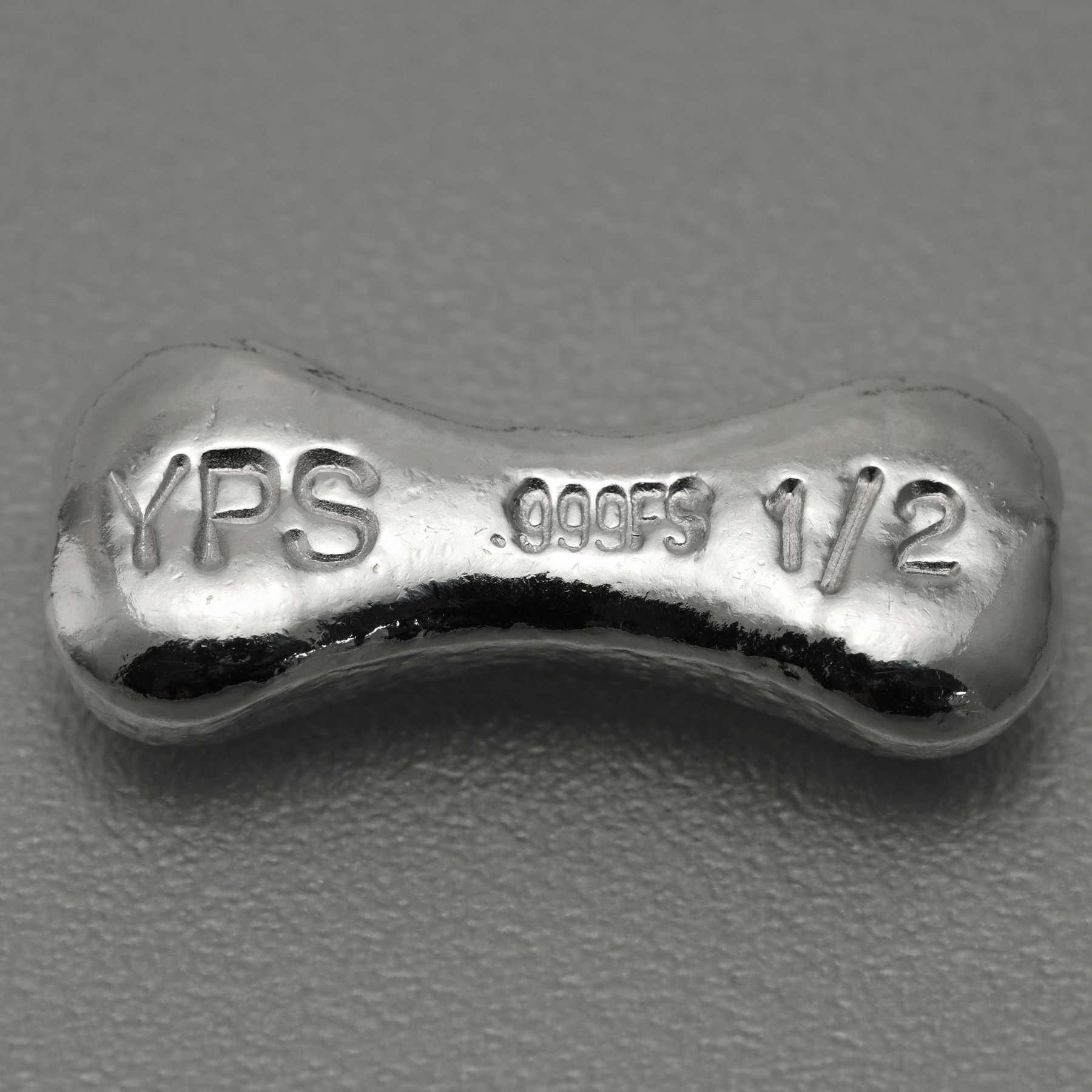 Silberbarren 1/2oz YPS "Knochen" 3D-Barren gegossen glänzend - Detailansicht 2