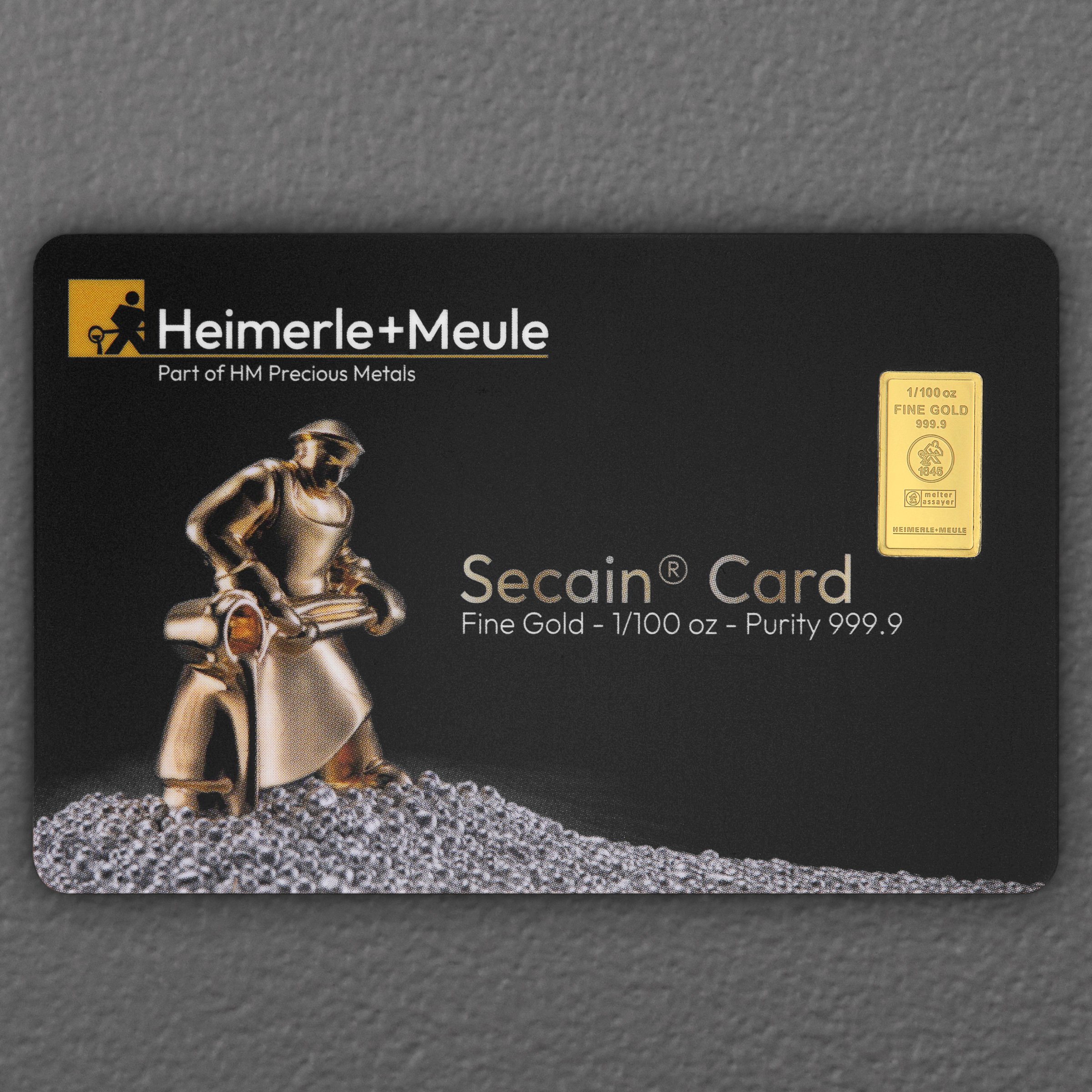 Goldbarren 1/100oz HEIMERLE + MEULE "Secain Card" geprägt - Hauptansicht